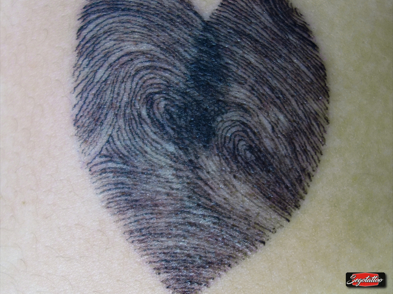 02.corazon huellas dactilares padres